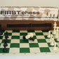 Triple weighted plastic chessmen with Vinyl chess board and tote tube