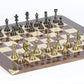 Brass Staunton Chessmen & Master Board Chess Set with gold & silver colored pieces